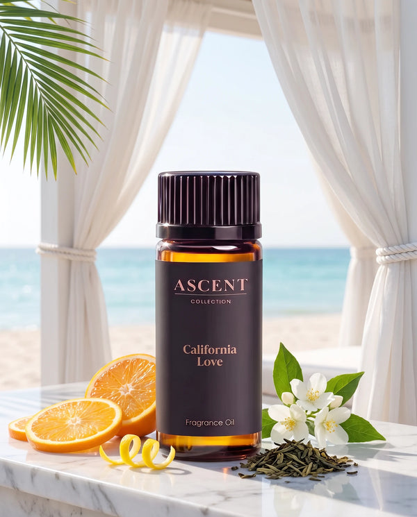 California Love fragrance oil by Ascent Collection in a luxury hotel setting with orange, lemon zest, green tea and jasmine